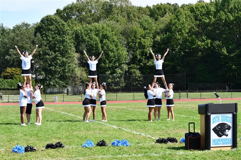  Rye Neck cheerleaders stand in formation during our Title IX event