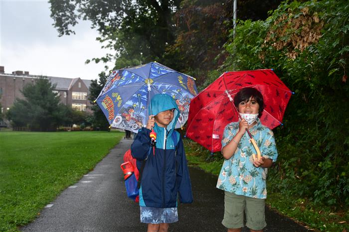 Students with umbrellas